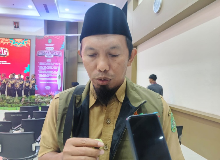 Camat Kembang Janggut, Suhartono