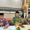 Kepala Bidang Pendidikan Agama dan Keagamaan Islam (Pakis) Kanwil Kemenag Kaltim, Muhammad Isnaini didampingin kepala Kemenag Kukar, Kabag TU, Kamis (18/6/26). (Dilla/lingkarkaltim)