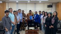 Pengurus GAMKI Kukar bersama Bupati Kukar, dr. Aulia Rahman Basri. (Dok. GAMKI Kukar)