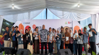 ekraf Kementerian Ekonomi Kreatif (Ekraf) mempercepat pemulihan pascabencana di Kabupaten Aceh Tamiang, Aceh melalui program 'Cerita Pulih: Pelatihan Fotografi dan Storytelling', Kamis (27/8/26). (dok. ekraf.go.id)