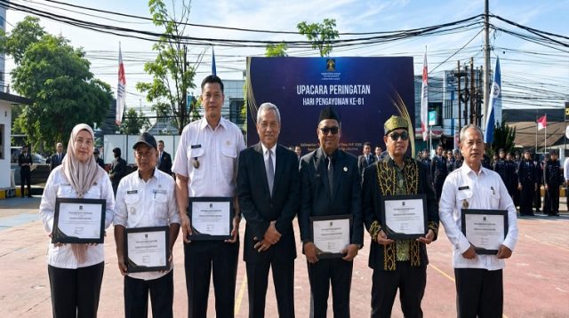 Foto bersama usai penyerahan penghargaan di Hari Pengayoman ke 81 Tahun 2026.(Dok.Kanwil Kemenkum Kaltim)