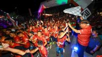 Rangkaian acara Merdeka Vaganza dan Merdeka Night Run 2026 di Plaza Ceremony KIPP Nusantara, Sabtu (15/8/2026) malam. Selain ajang olahraga lari, kegiatan ini diisi dengan panggung hiburan, area UMKM lokal, dan layanan pemeriksaan kesehatan gratis. (Dok. Humas Otorita Ibu Kota Nusantara)