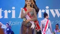 Esther Veronika saat menerima penghargaan sebagai Putri Pariwisata Kaltim 2025. (Foto:Esther Veronika)