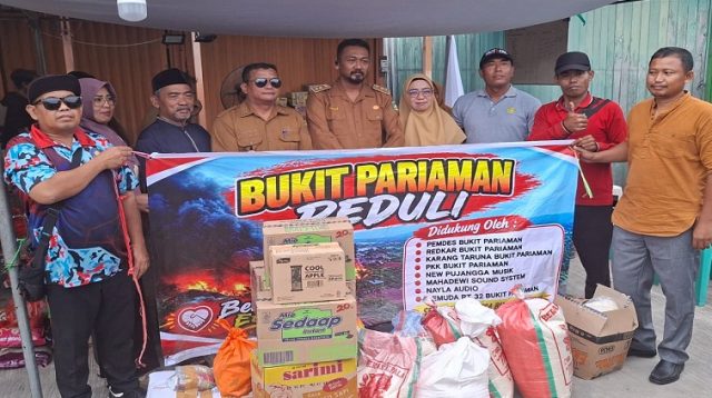 Kepala Desa Bukit Pariaman Serahkan Sembako ke posko Jl. Kartini, Loa Ipuh Kec. Tenggarong untuk korban musibah kebakaran Gang Karya,Senin (19/10/26).